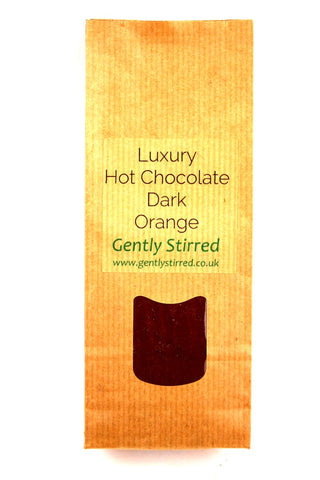 Luxury Hot Chocolate Powder Dark Orange Gently Stirred