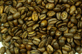 Sumatran Cafe Femenino Permata Gayo Coop Organic Fair Trade Coffee Beans Gently Stirred