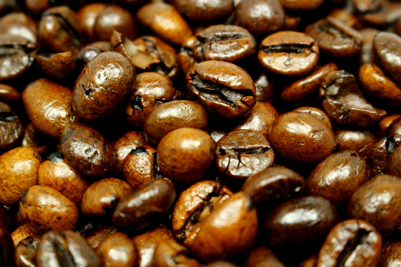 Almond Cherry Chocolate Flavoured Coffee Beans Gently Stirred