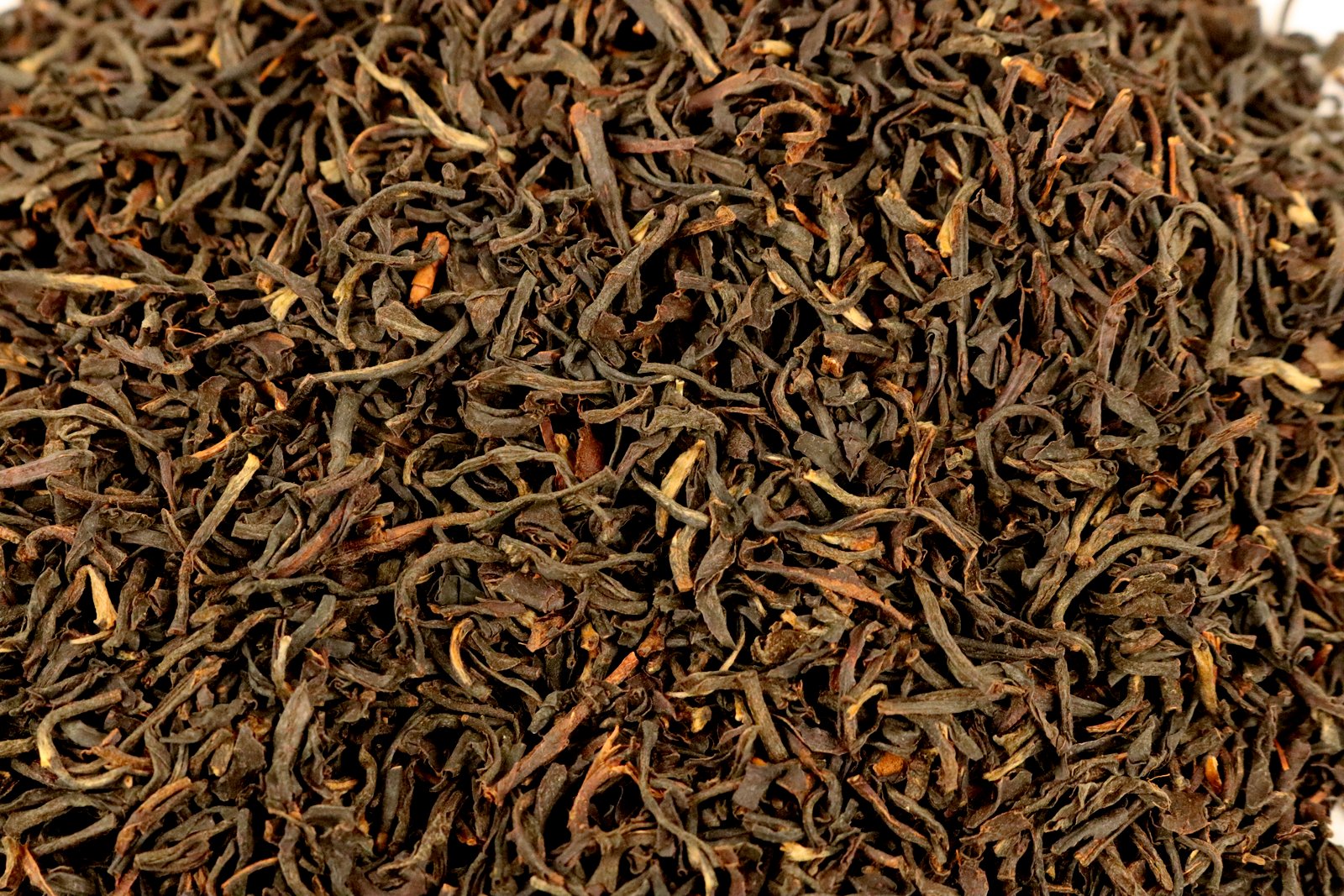 Assam Cherideo Purbat Orange Pekoe Organic Loose Leaf Black Tea Gently Stirred