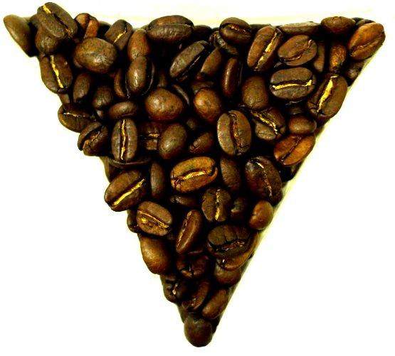 Christmas Flavoured Whole Roasted Coffee Beans Gently Stirred