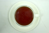 Coconut Flavoured - Whole Leaf Black Tea - Delicate Aroma - Good Taste - Can Take Some Milk Coconut Perhaps - Gently Stirred