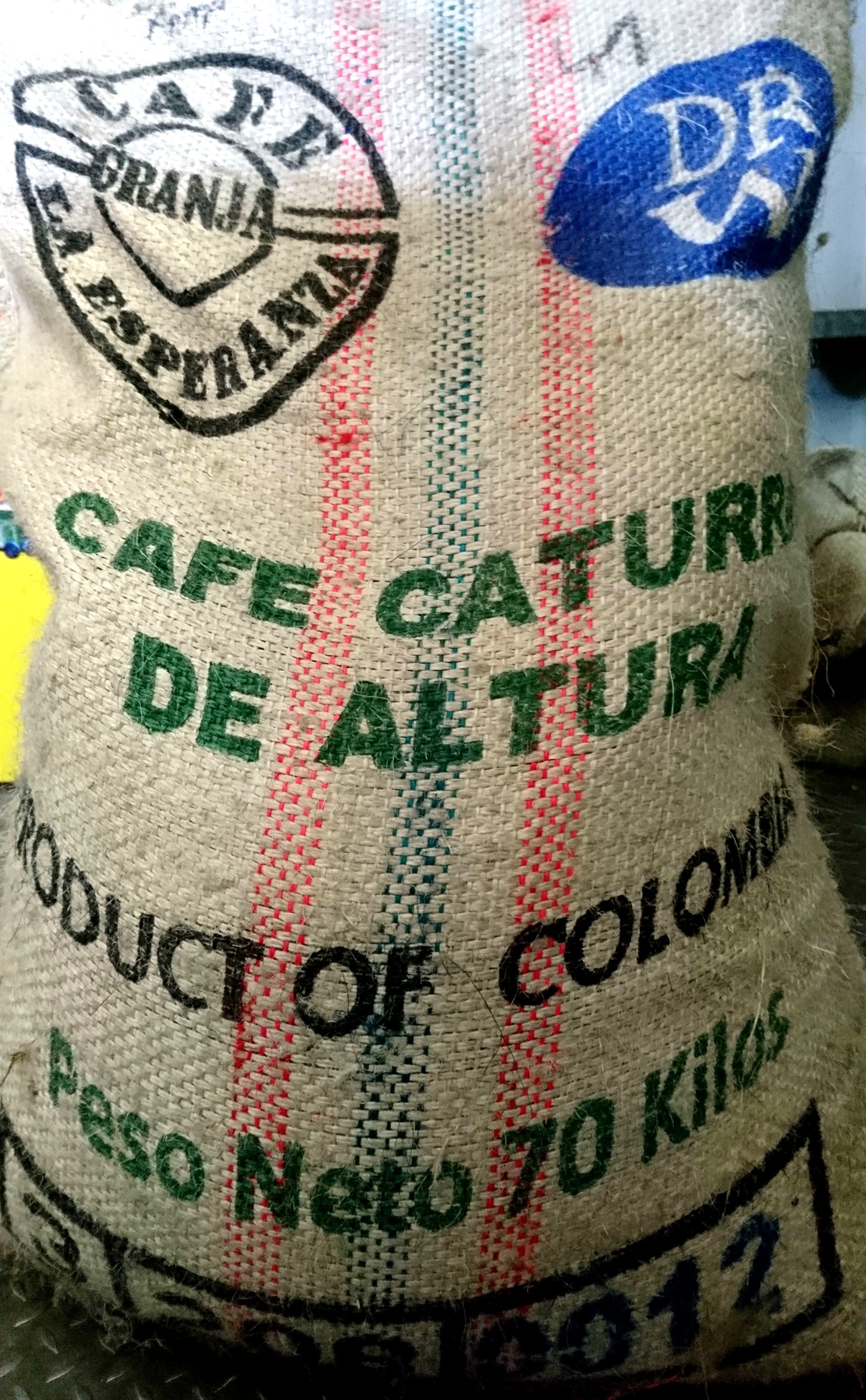 Colombian Granja La Esperanza Caturra De Altura Whole Beans Coffee Gently Stirred