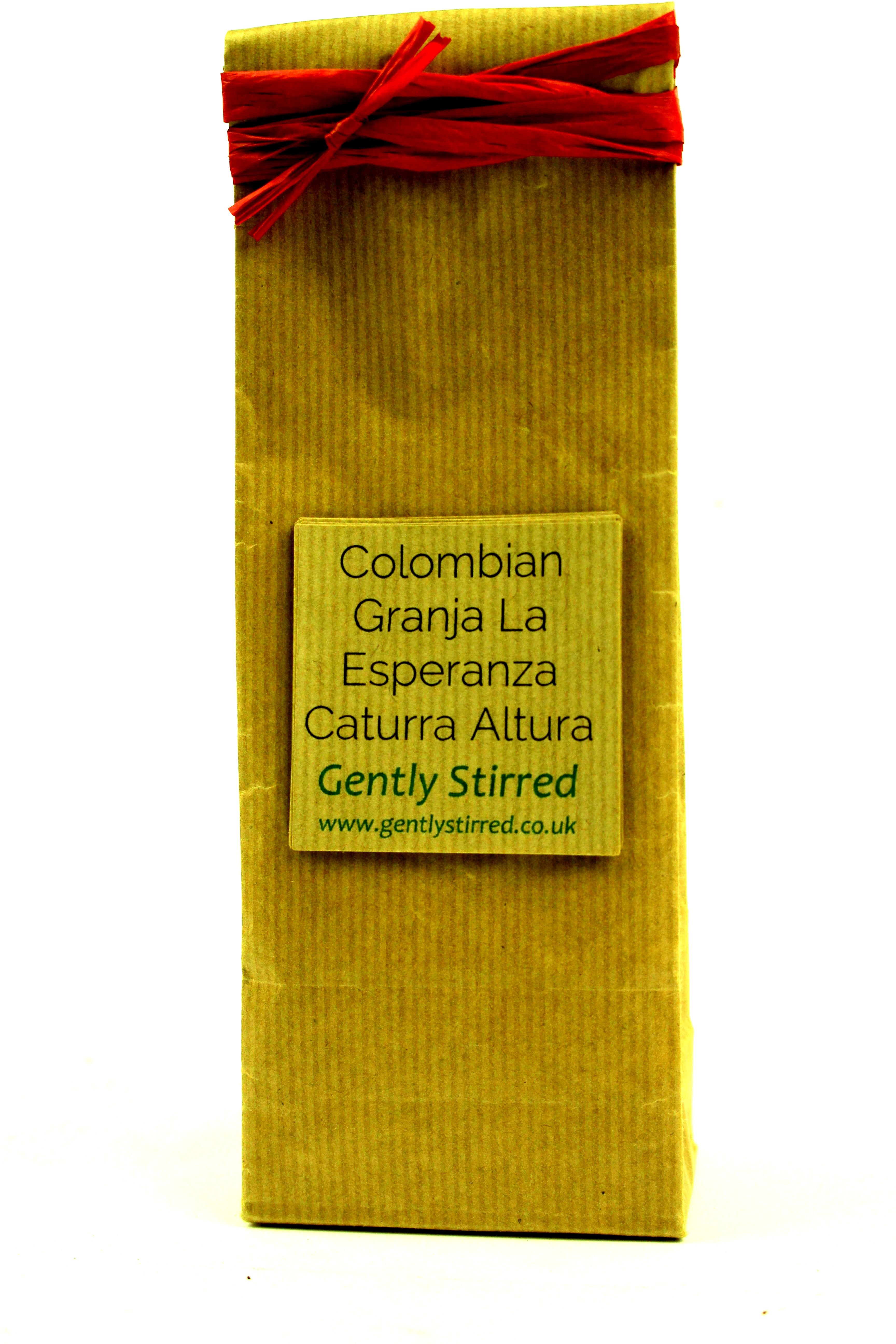Colombian Granja La Esperanza Caturra De Altura Whole Beans Coffee Gently Stirred