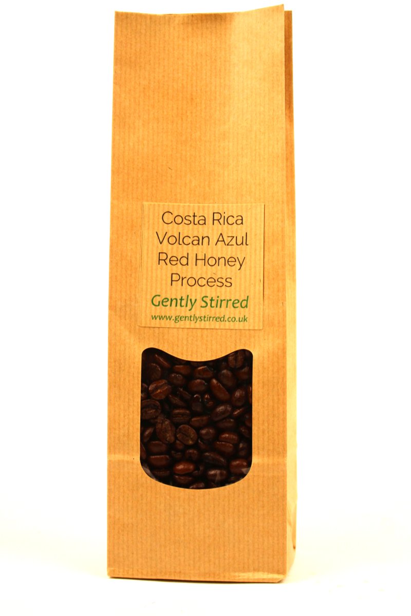 Costa Rica Volcan Azul Red Honey Process Whole Coffee Beans Gently Stirred