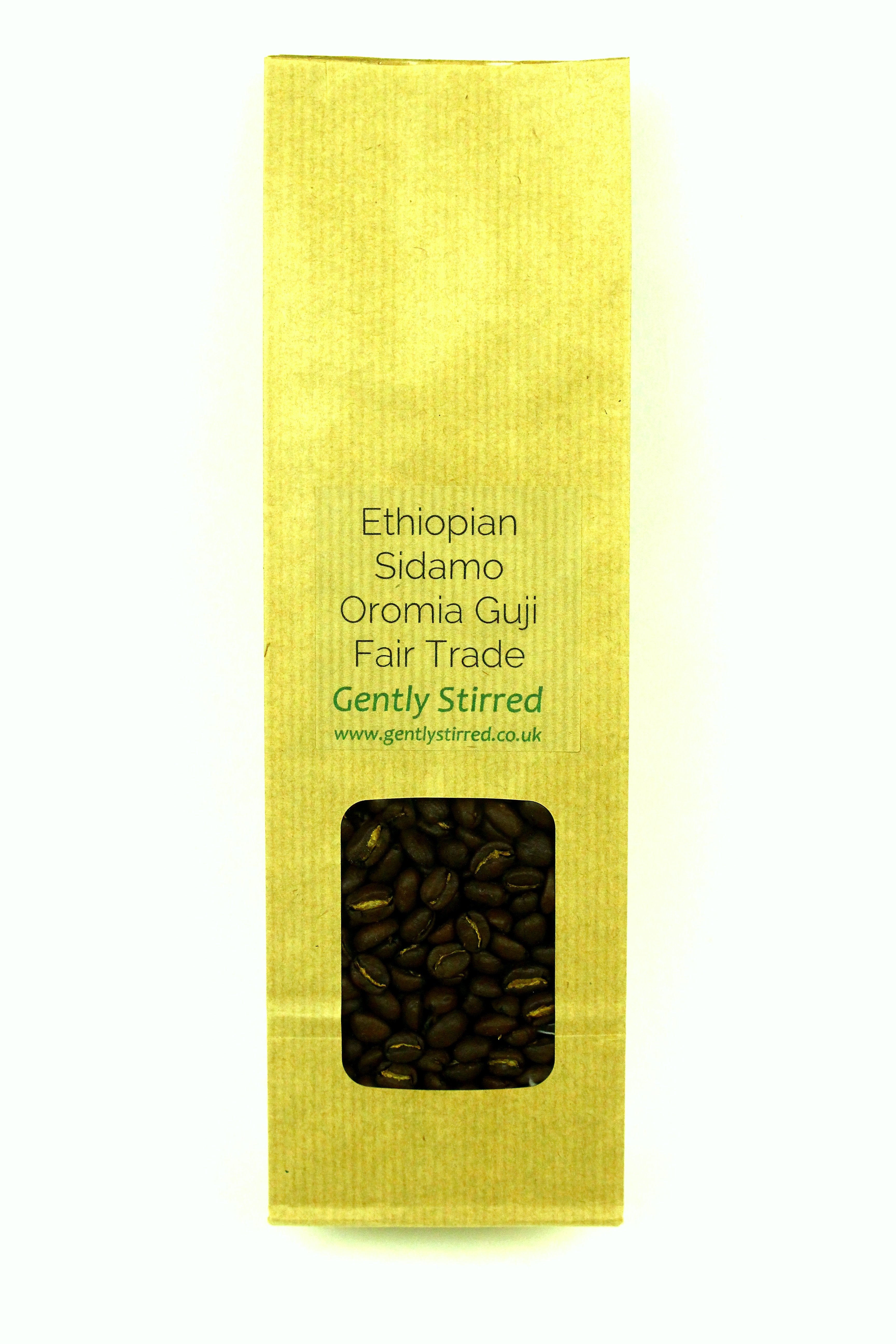 Ethiopian Washed Sidamo Oromia Guji Fair Trade Whole Bean Coffee Gently Stirred