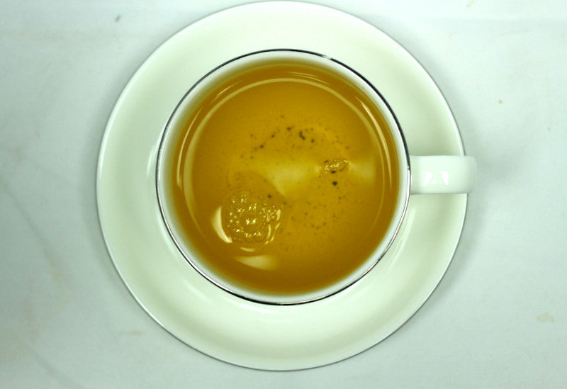 Fujian Organic Tie Guan Yin Milk Oolong Xuan Yin Gently Stirred