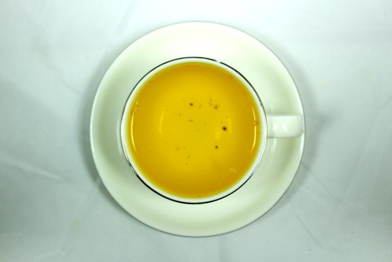 Organic Chamomile Flower Herbal Tea Gently Stirred