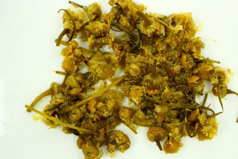 Organic Chamomile Flower Herbal Tea Gently Stirred