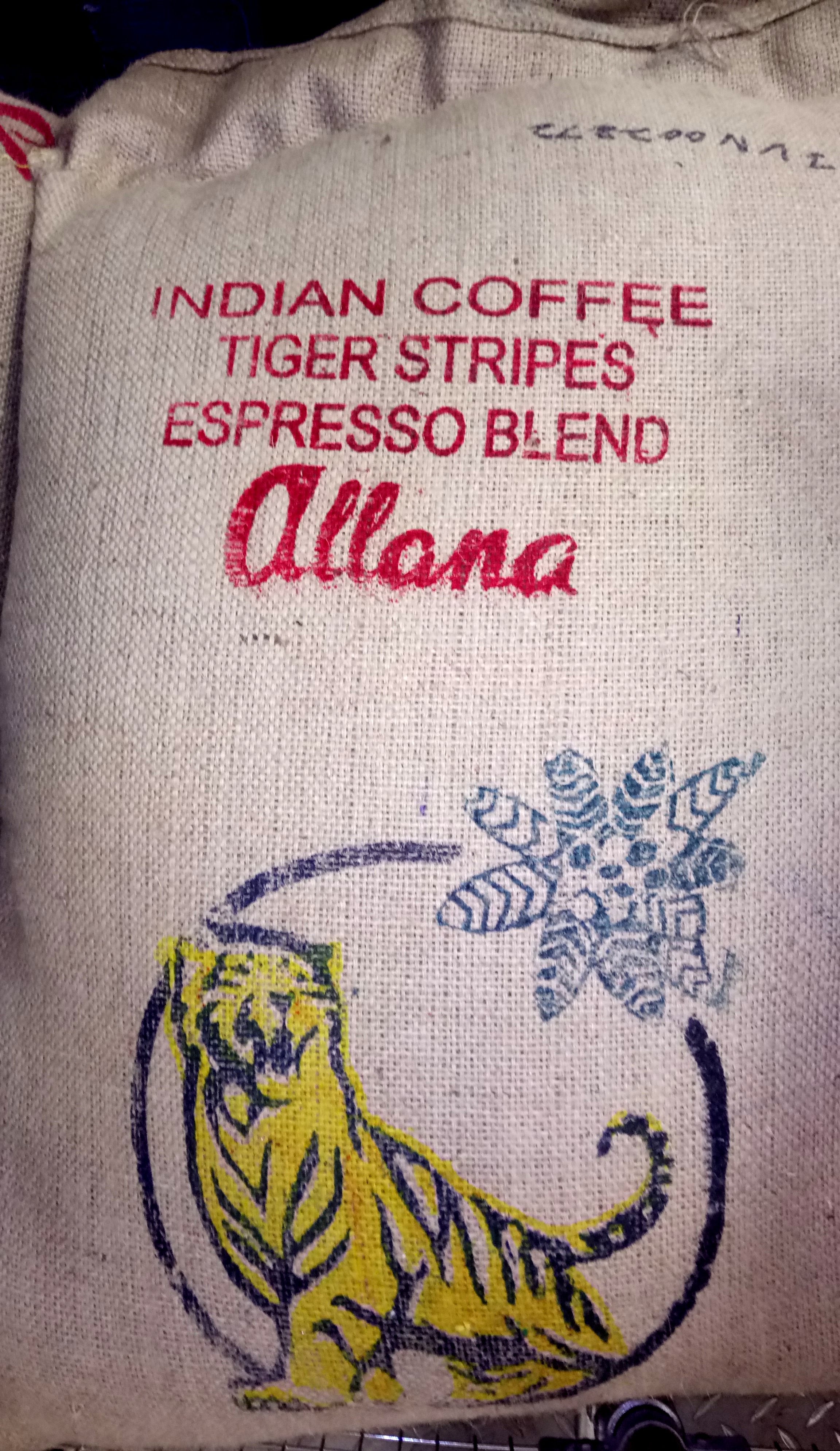 Indian Allana Tiger Stripes Espresso Blend Whole Bean Coffee Gently Stirred