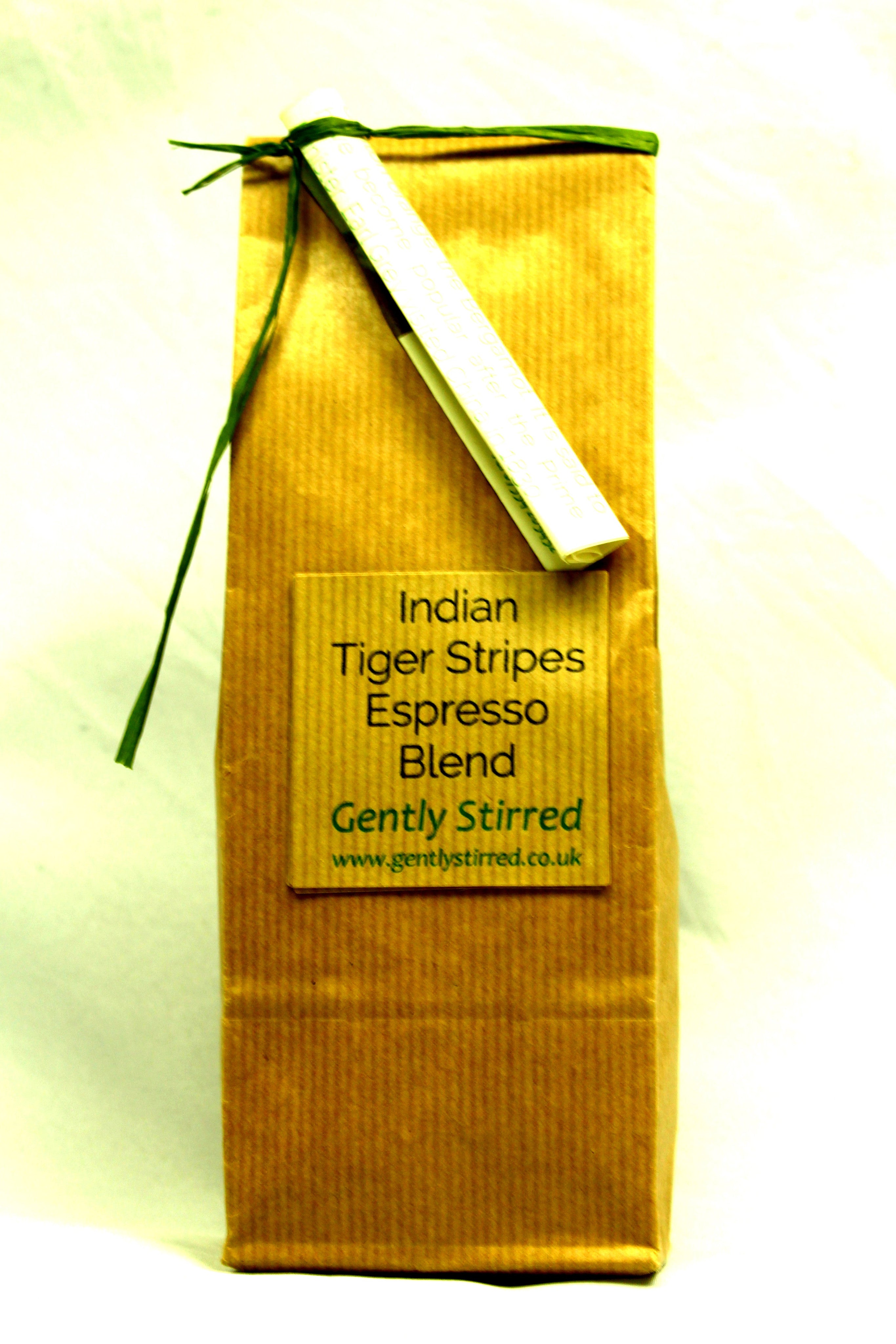 Indian Allana Tiger Stripes Espresso Blend Whole Bean Coffee Gently Stirred