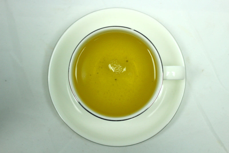 Kombucha Sencha Green Tea Gently Stirred