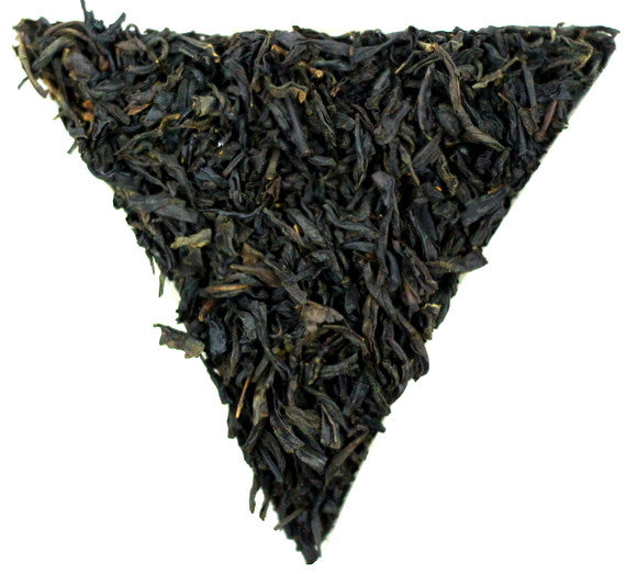Chinese Lapsang Souchong Roasted Tea Gently Stirred