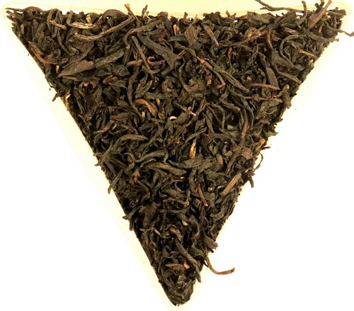 Lapsang Souchong Tarry Organic Loose Leaf Smoked Black Tea Gently Stirred