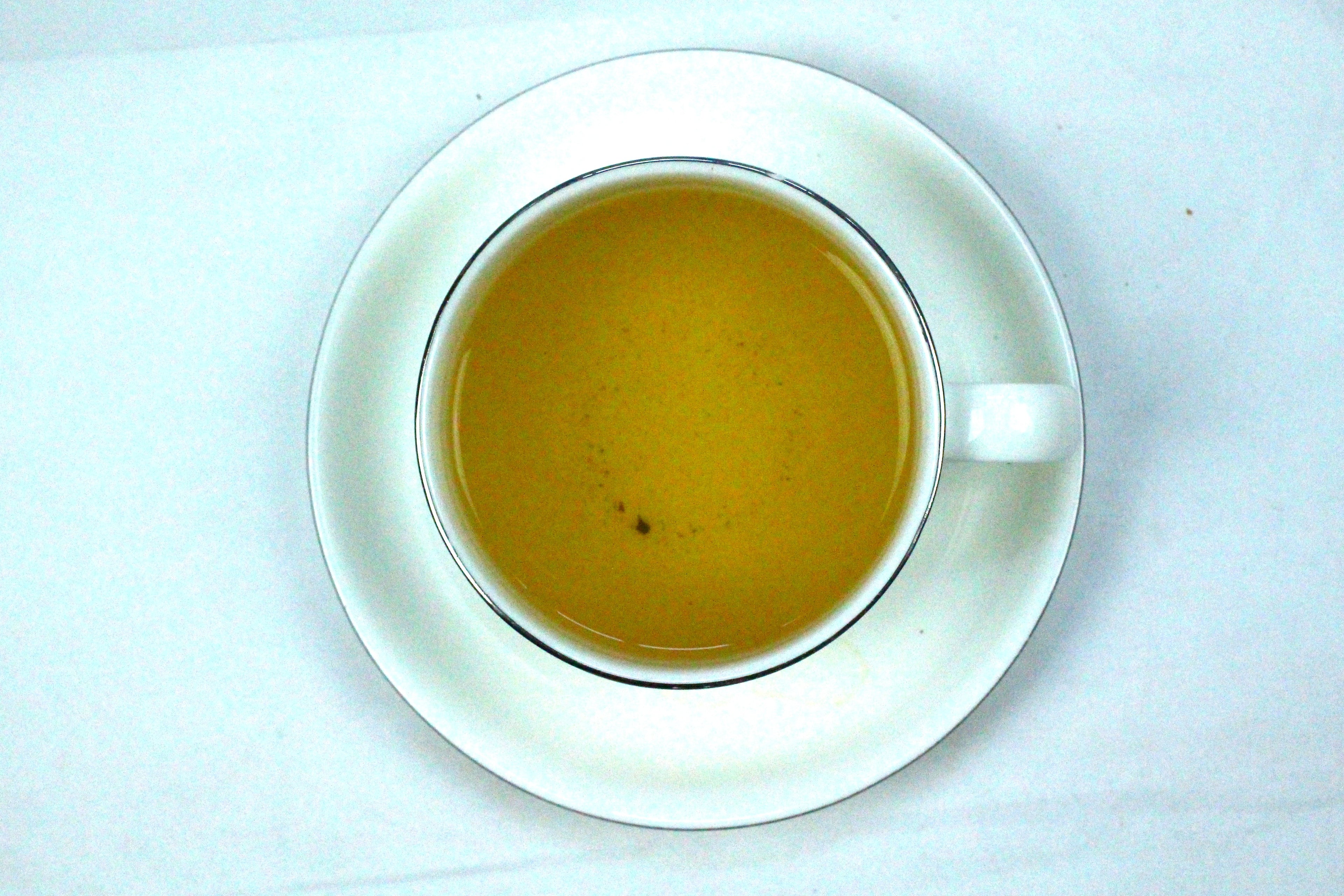 Nepal Guranse SFTGFOP Grade 1 Emerald Green Organic Loose Leaf Tea Gently Stirred