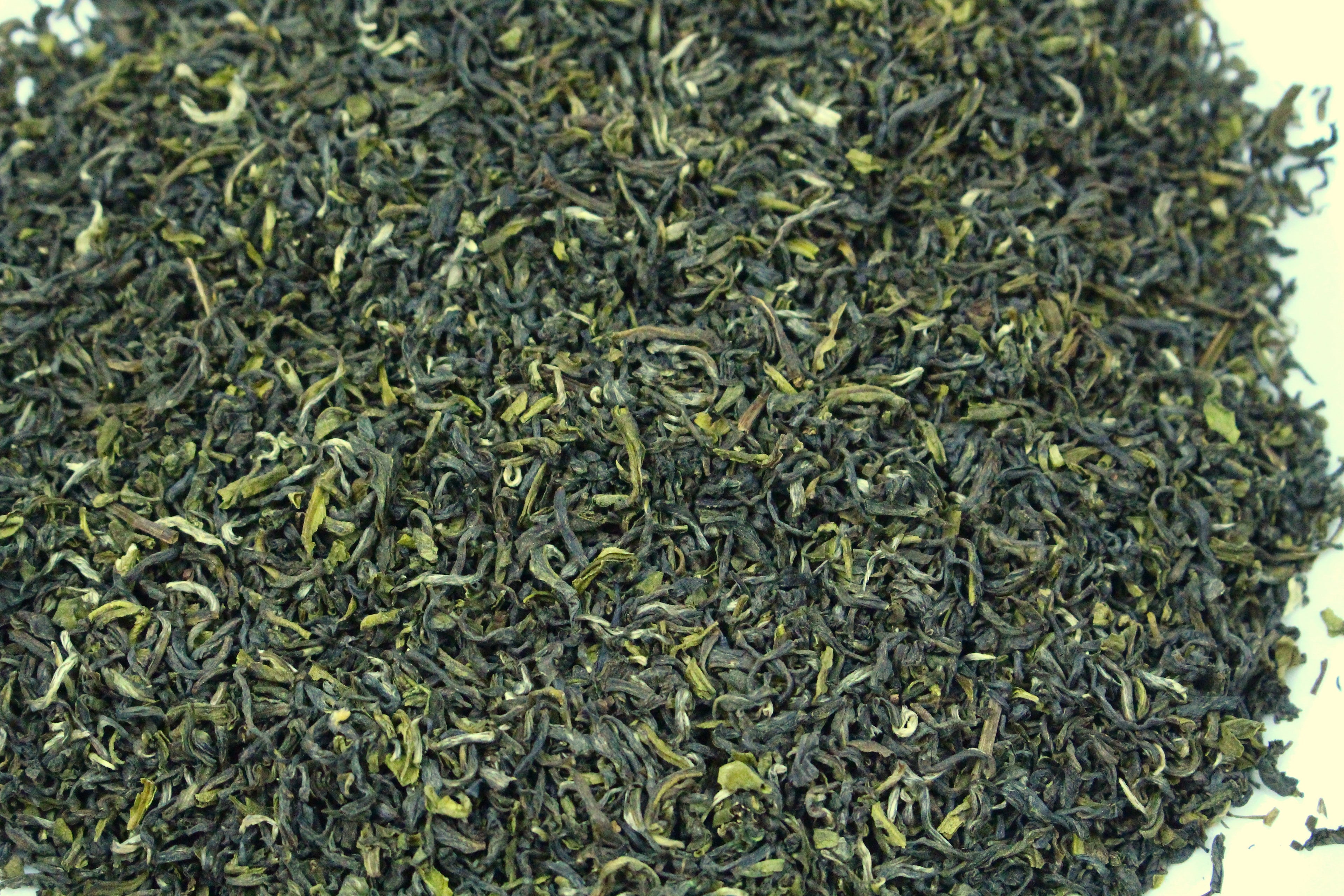 Nepal Guranse SFTGFOP Grade 1 Emerald Green Organic Loose Leaf Tea Gently Stirred