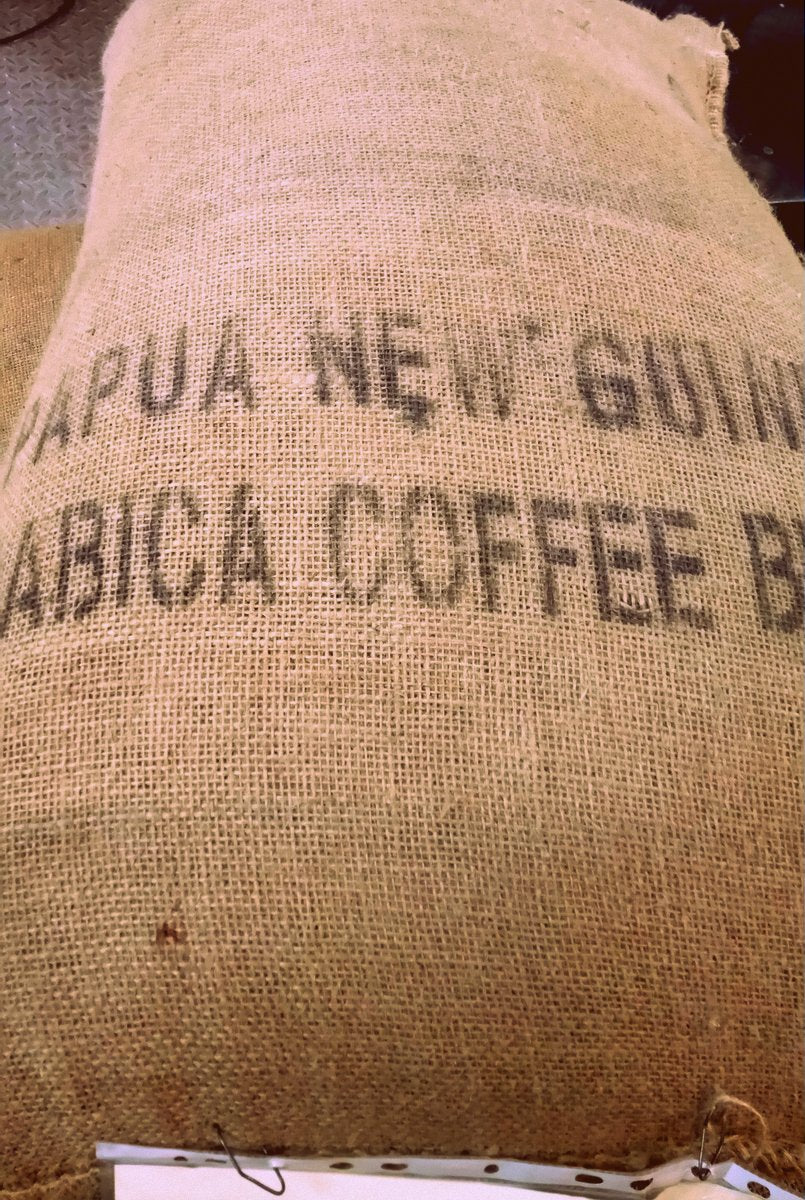 Papua New Guinea Highland Plantation AX Grade Whole Bean Coffee Gently Stirred