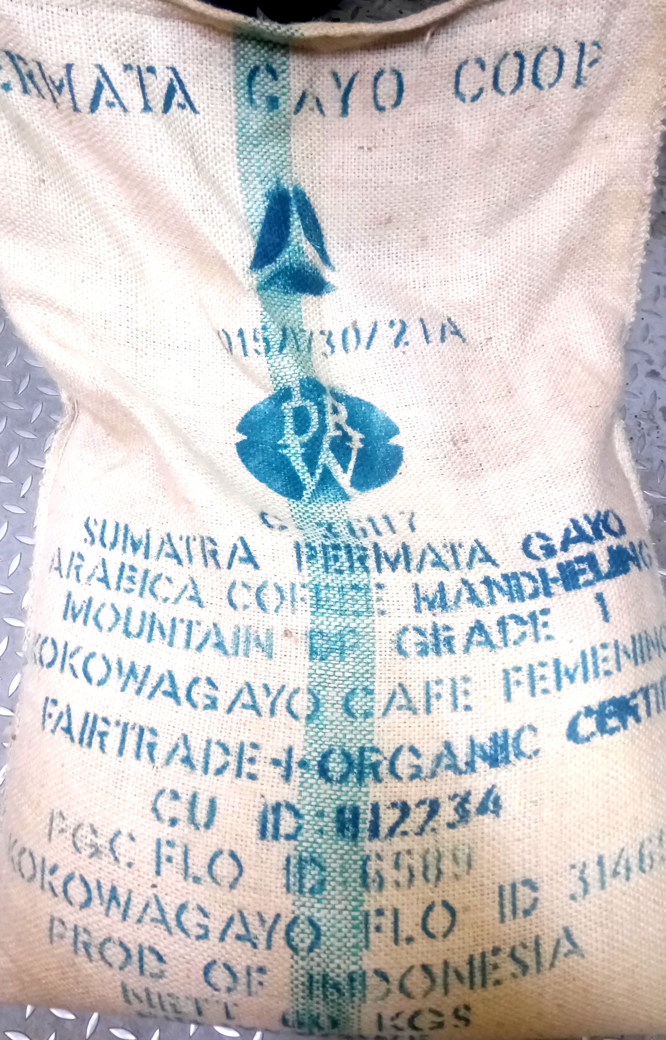 Sumatran Cafe Femenino Permata Gayo Coop Organic Fair Trade Coffee Beans Gently Stirred
