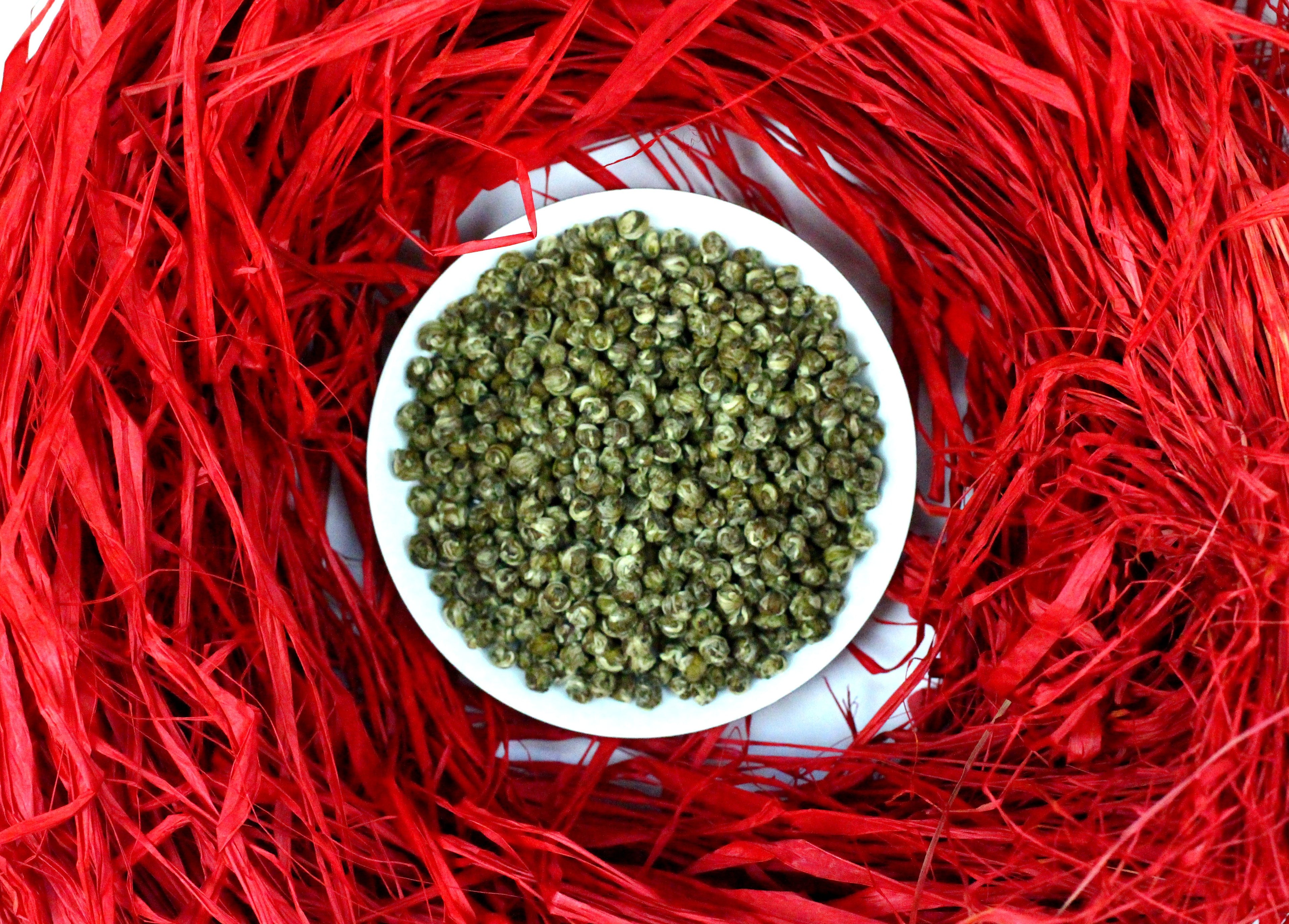 Tai Mu Long Zhu Organic Dragon Pearls White Tea Gently Stirred