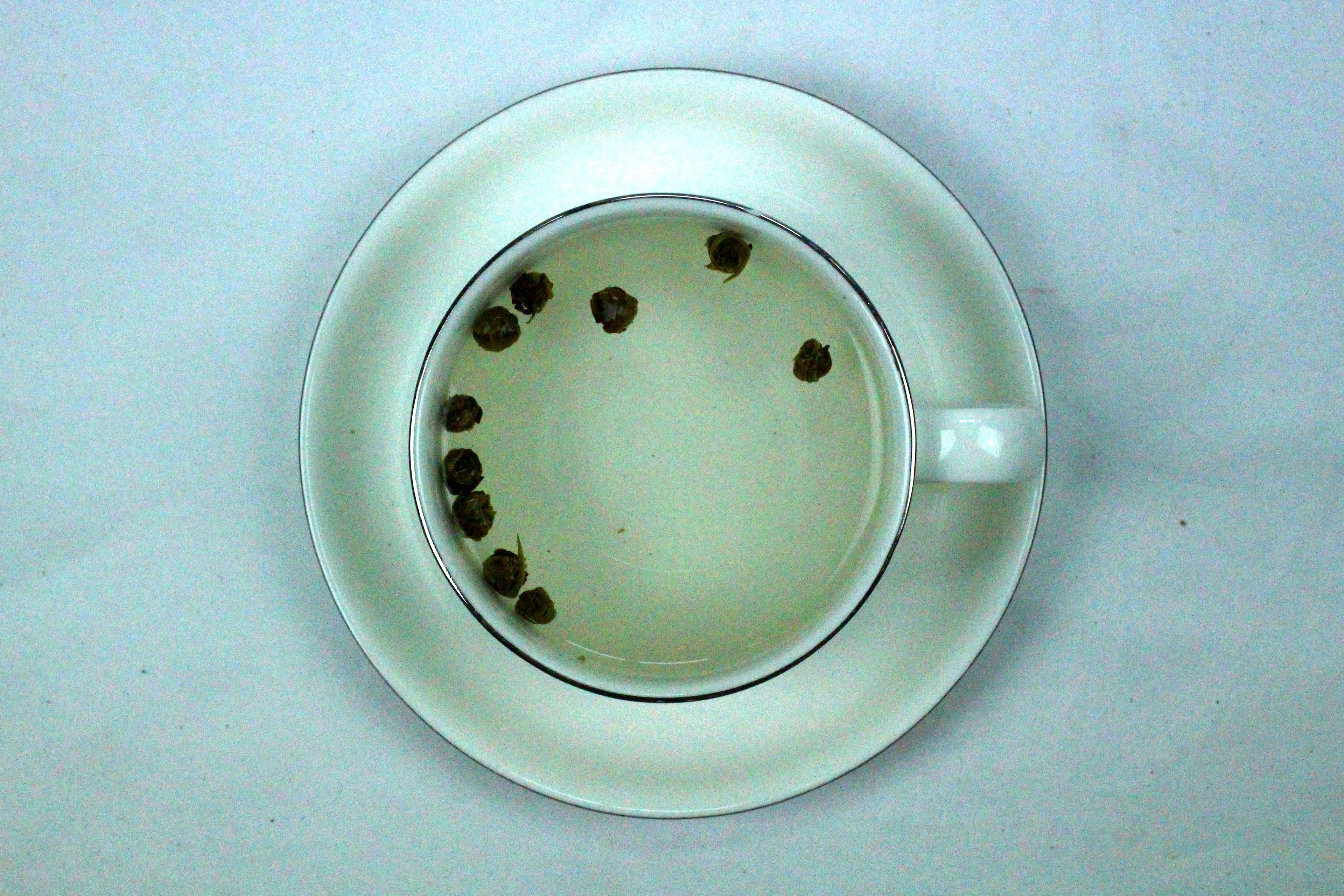 Tai Mu Long Zhu Organic Dragon Pearls White Tea Gently Stirred