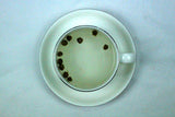 Tai Mu Long Zhu Organic Dragon Pearls White Tea Gently Stirred