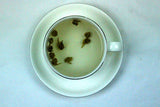 Tai Mu Long Zhu Organic Dragon Pearls White Tea Gently Stirred