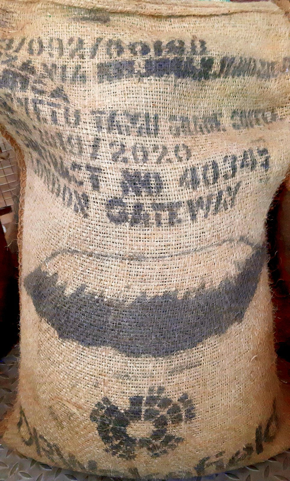 Tanzania Kilimanjaro Yetu Tamu Peaberry Whole Bean Coffee Gently Stirred