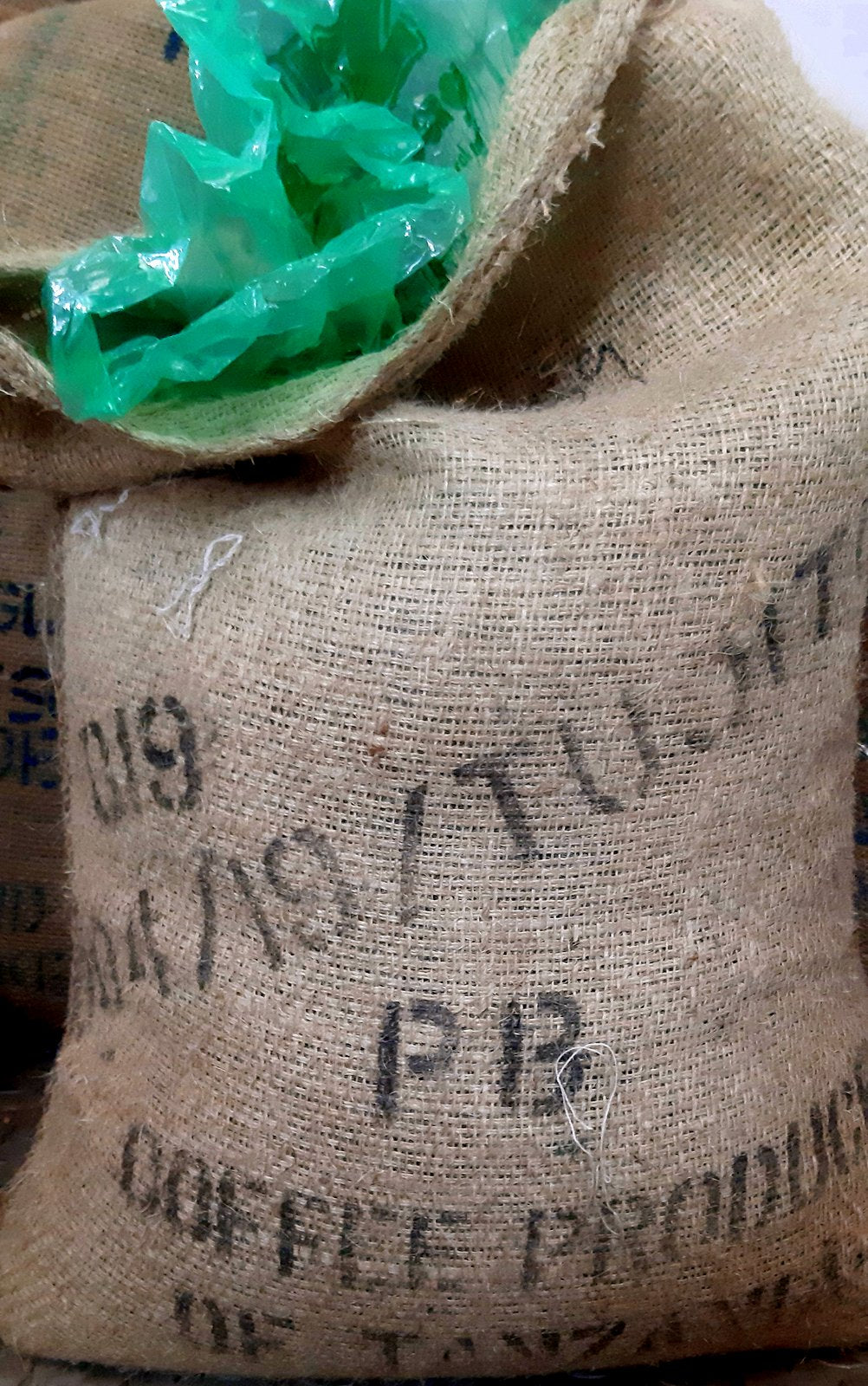Tanzania Kilimanjaro Yetu Tamu Peaberry Whole Bean Coffee Gently Stirred