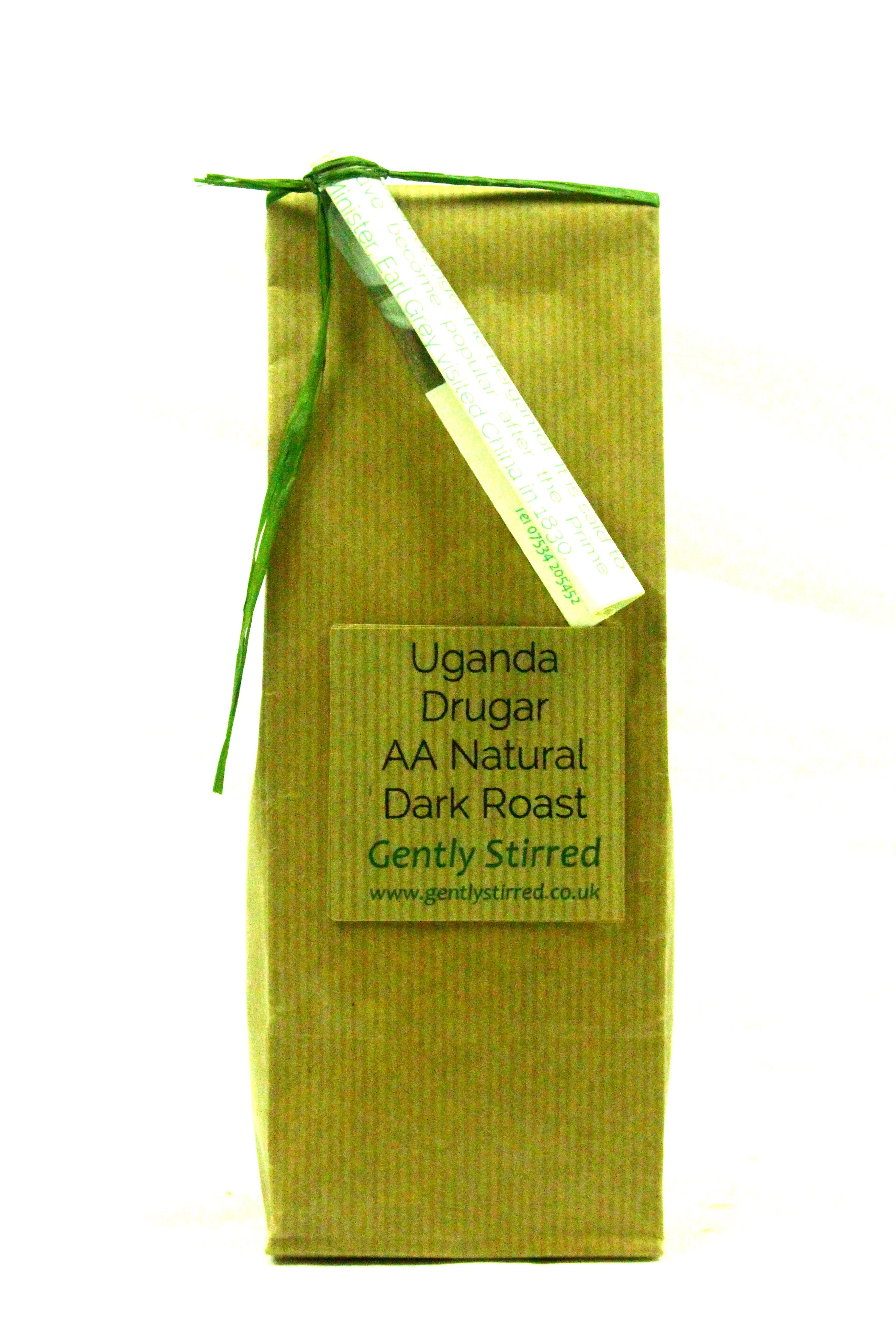 Uganda Drugar AA Natural Process Dark Roast Coffee Beans Gently Stirred