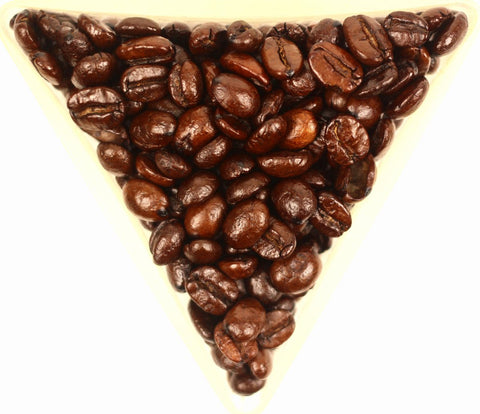 Vanilla Cream Flavoured Whole Coffee Beans Gently Stirred
