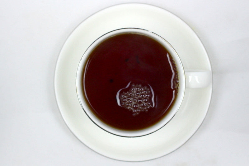 Vietnam Golden Tippy OP Organic Black Tea Gently Stirred