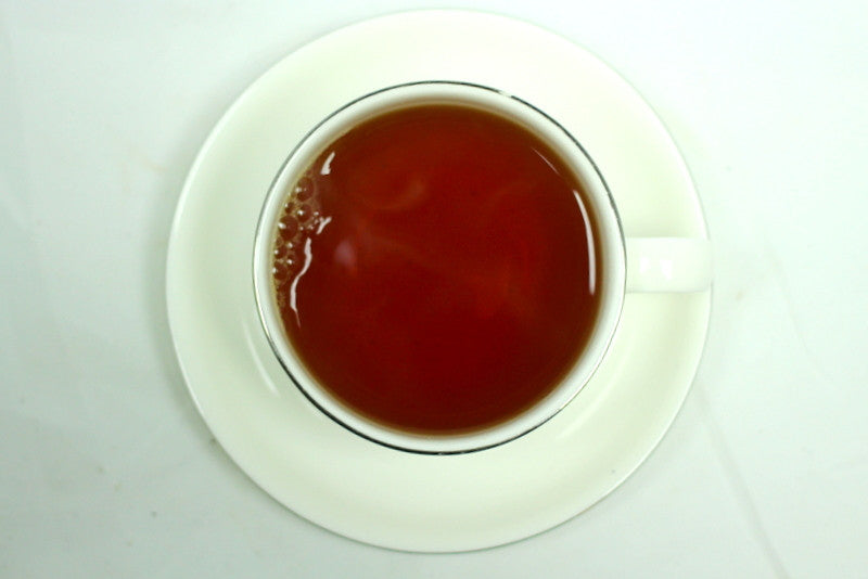 Violet Flower Scented Tea Gently Stirred