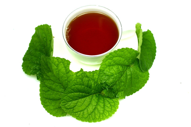 Violet Flower Scented Tea Gently Stirred