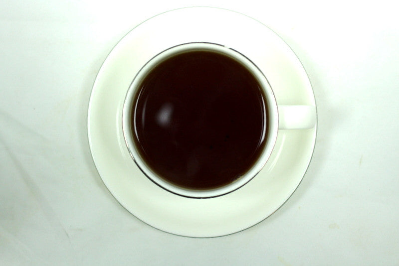 Yunnan Pu-Erh Grade 1 Tea Gently Stirred 